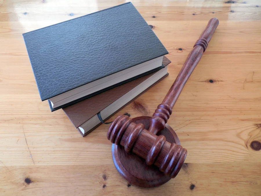 Wooden gavel and law books, representing legal deadlines in Arizona