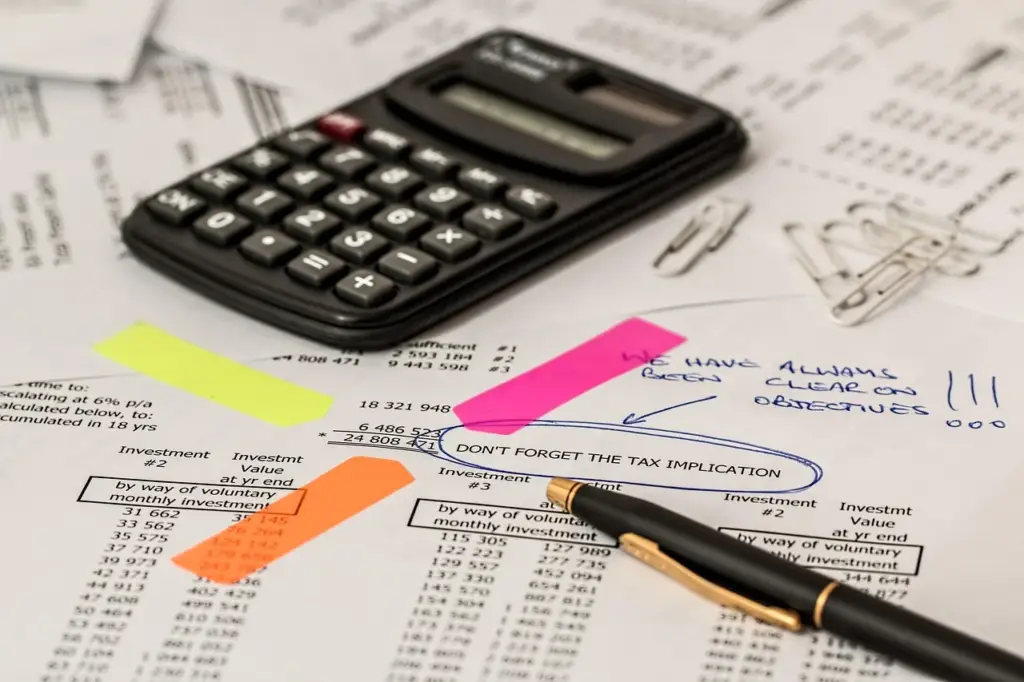 Insurance documents and paperwork on a desk